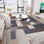 Tapis bleu touffeté à motif géométrique Allyne-1282471293