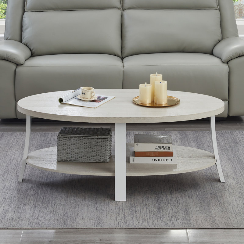 Élégante table basse ovale avec tablette en bois blanc pratique