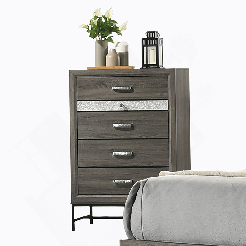 Commode de style contemporain à 4 tiroirs avec pieds en métal et poignées décoratives en acrylique