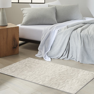 Tapis ivoire gris Calvin Klein