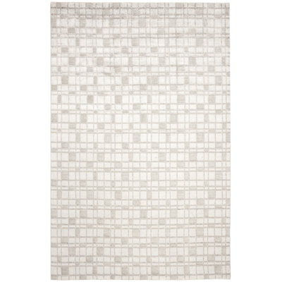 Tapis géométrique ivoire en coton tissé à la main Oliveri