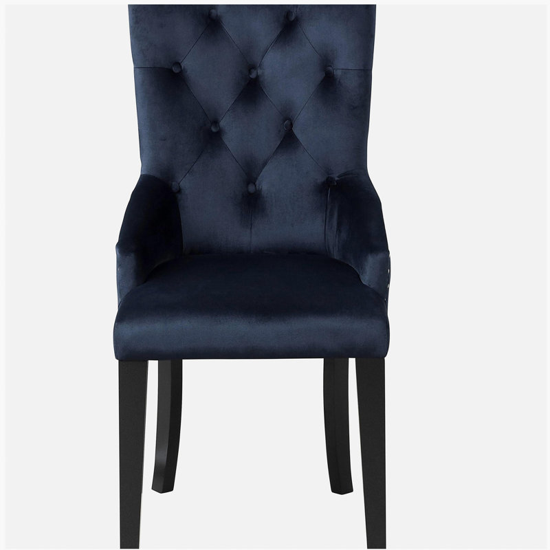 Fauteuil capitonné à dossier