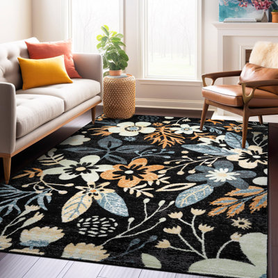 Tapis noir à motif floral multicolore