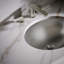 Lavabo de salle de bain ovale encastré en métal Bachata-13641246