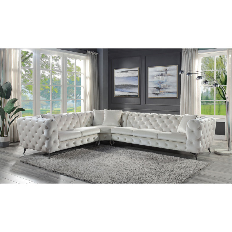 Canapé modulaire en tissu beige avec 4 coussins Atronia