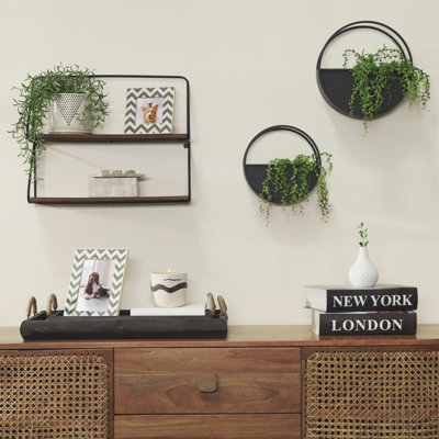 De magnifiques pots à fleurs ronds en métal, un mélange parfait de style et de fonctionnalité pour votre décor.