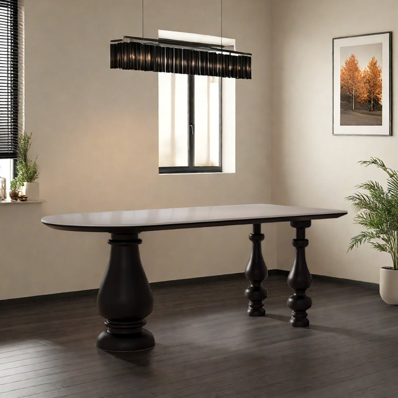 Une table avec un plateau en pierre et trois pieds, H 29,52 po x L 78,74 po x l 31,49 po