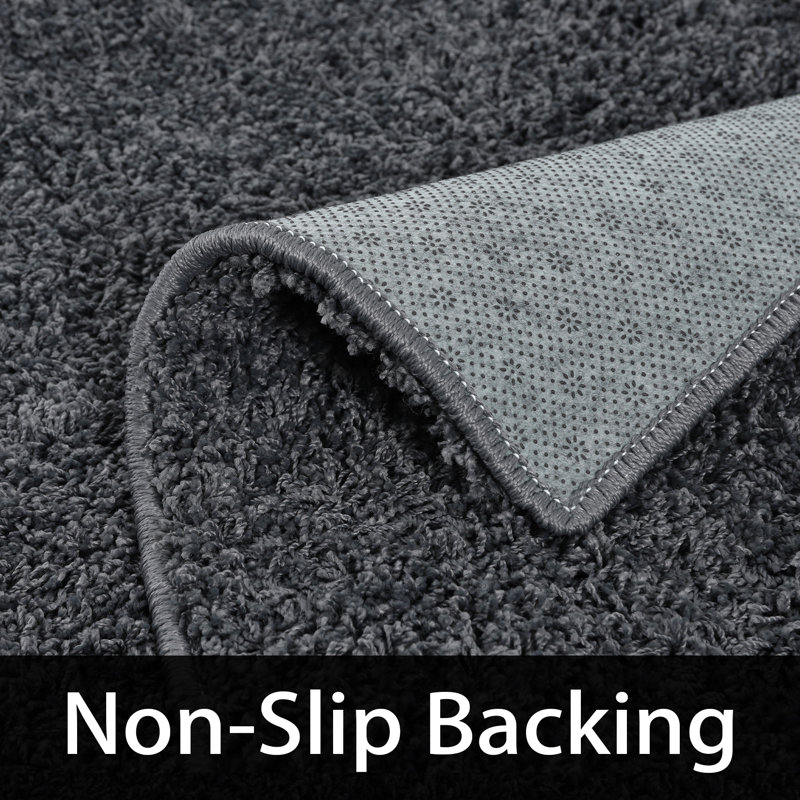 Tapis intérieur / extérieur gris foncé en polypropylène tissé à la machine Hailes, Rectangle 12 pi x 18 pi