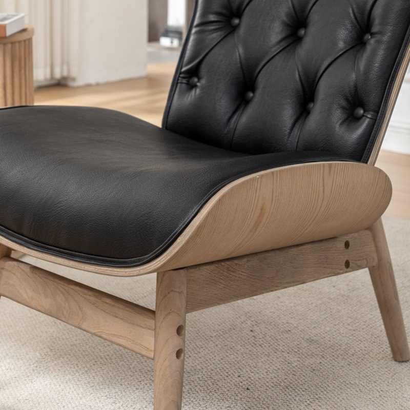 Fauteuil à oreilles en cuir Khamisi