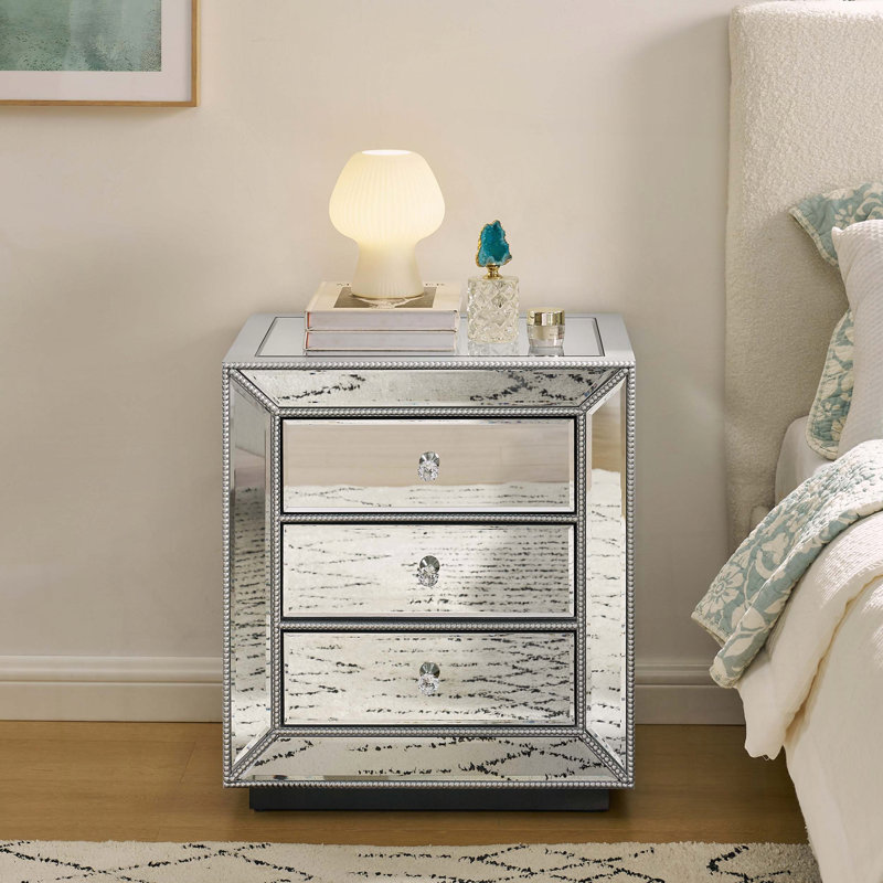 Armoire à finition miroir à trois tiroirs