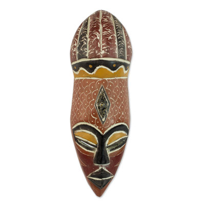 Décoration murale à masque de bois nigérien artisanal