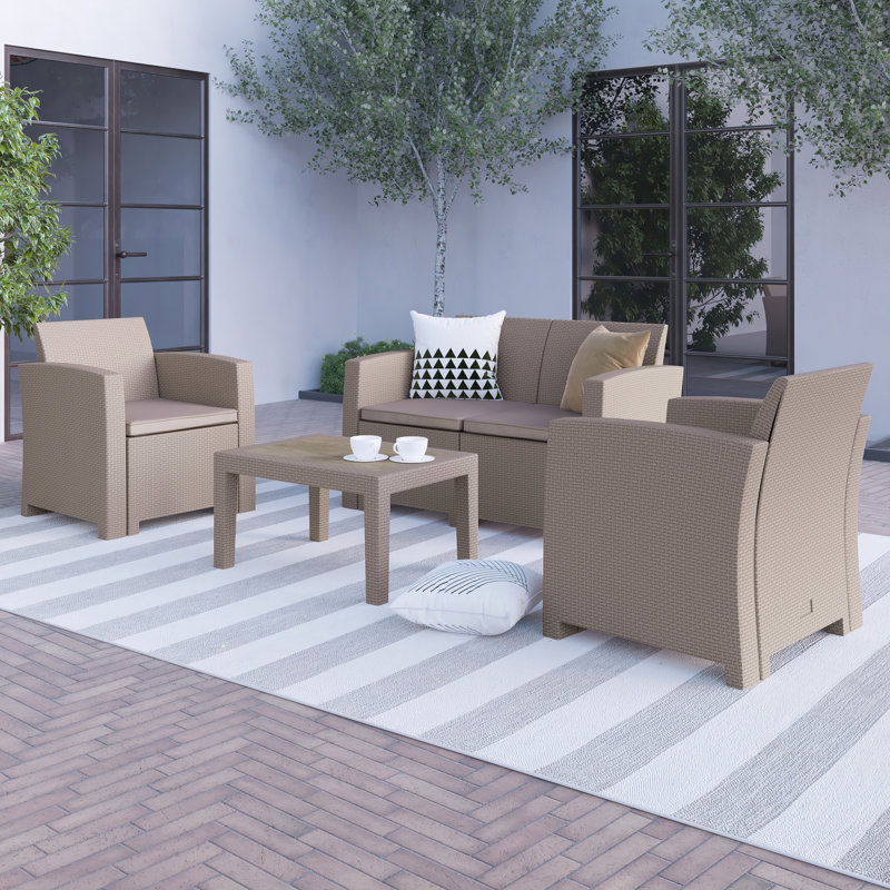 Ensemble de 4 chaises d'extérieur en faux rotin, causeuse et table Alderman