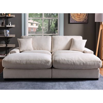 Canapé modulaire 4 places - Revêtement en velours côtelé avec 2 repose-pieds et coussins confortables et surdimensionnés dans un salon polyvalent