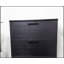 Commode noire à quatre tiroirs Oliver, solution de rangement spacieuse et élégante pour une maison de campagne moderne et un décor industriel.