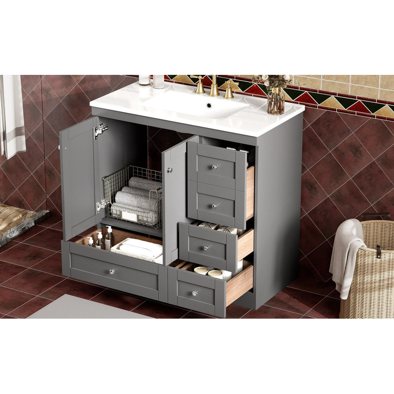 Armoire de salle de bain sur pieds 36 po avec lavabo en céramique, 4 tiroirs à fermeture en douceur et 2 portes à fermeture en douceur Shaker