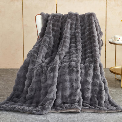 Ashritha Throw Blanket