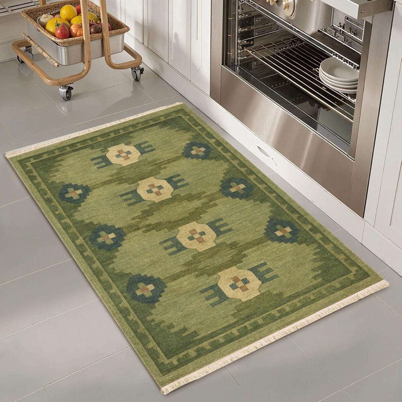Tapis vert olive à losanges