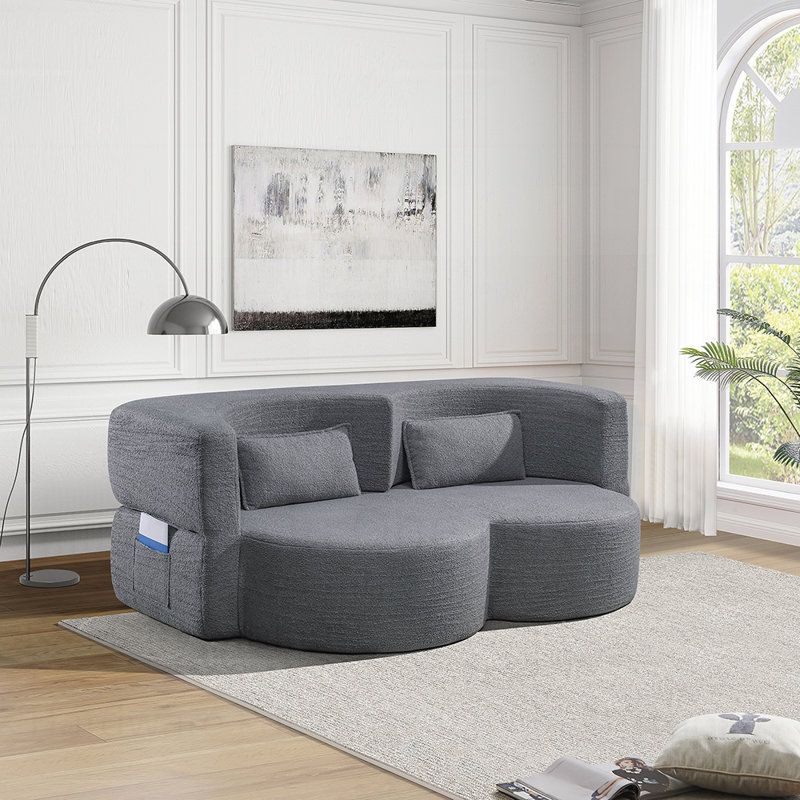 Canapé-lit pliant polyvalent avec un design peu encombrant, idéal pour les petits espaces et une utilisation multifonctionnelle
