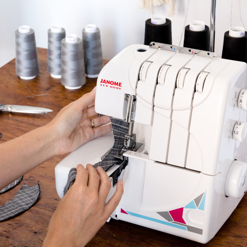Compact White and Gray Portable Serger Machine