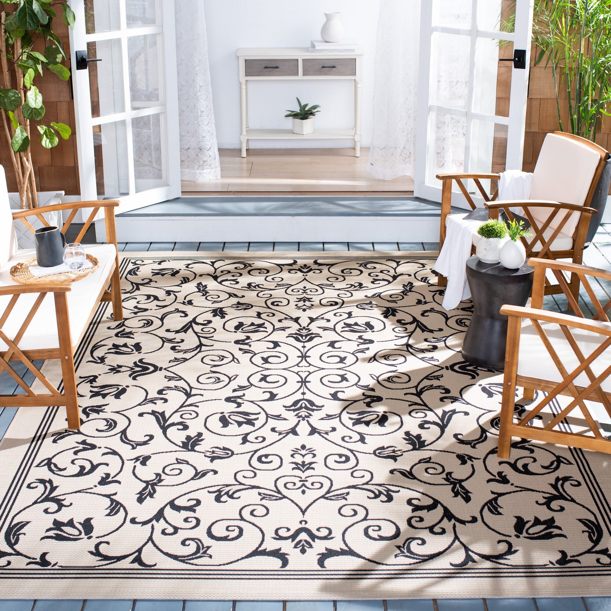 Asao Bordered Gold/Black Indoor/Outdoor Area Rug Wade Logan Pattern: Geometric, Rug Size: Rectangle 8' x 10