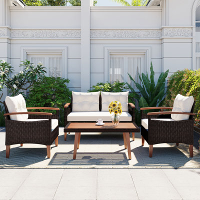 Aadyanth Acacia Wicker 4 - Person Patio Conversation Set with Cushions