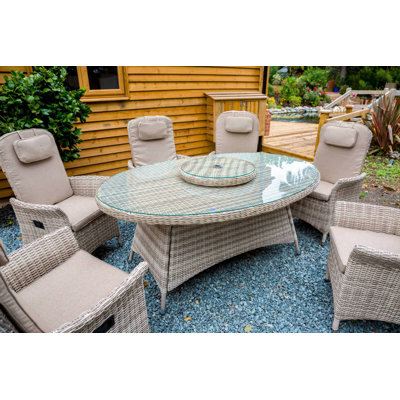 Jaffrey 6 - Person Patio Dining Set Umbrella Hole Included Oval Table with Cushions Included