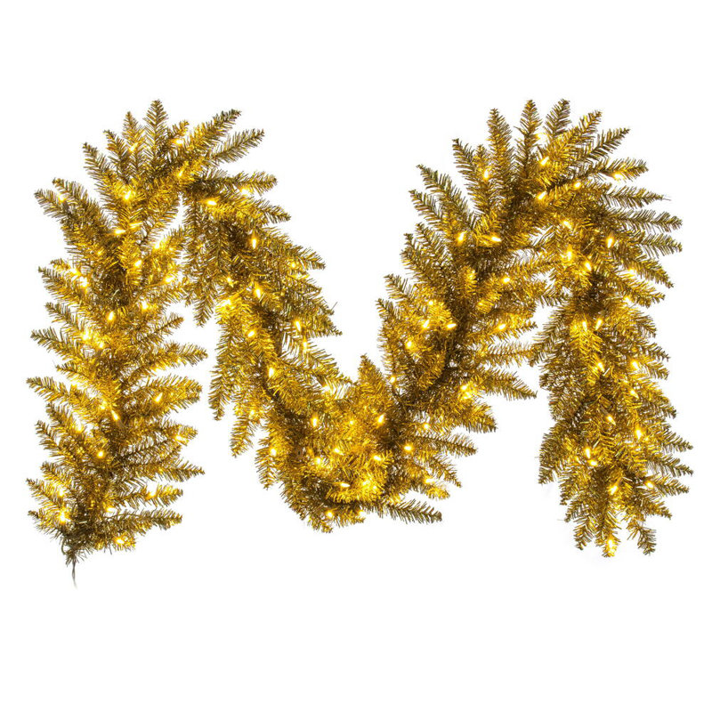 The Holiday Aisle® 9' x 14" Gold Tinsel Artificial Garland with Warm White LED Lights.