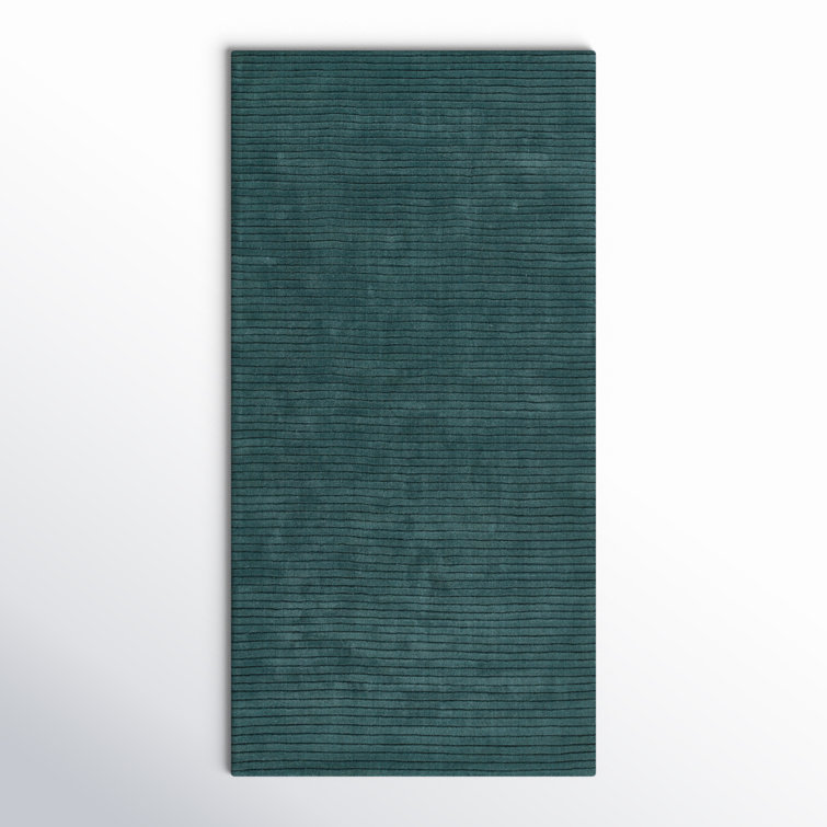 Guiness Solid Color Hand Loomed Wool Area Rug in Blue