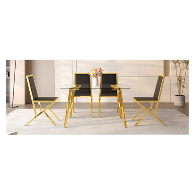 Ensemble de salle à manger luxueux doré - table en verre moderne et 4 chaises en polyuréthane noir, mobilier de cuisine contemporain à base en métal