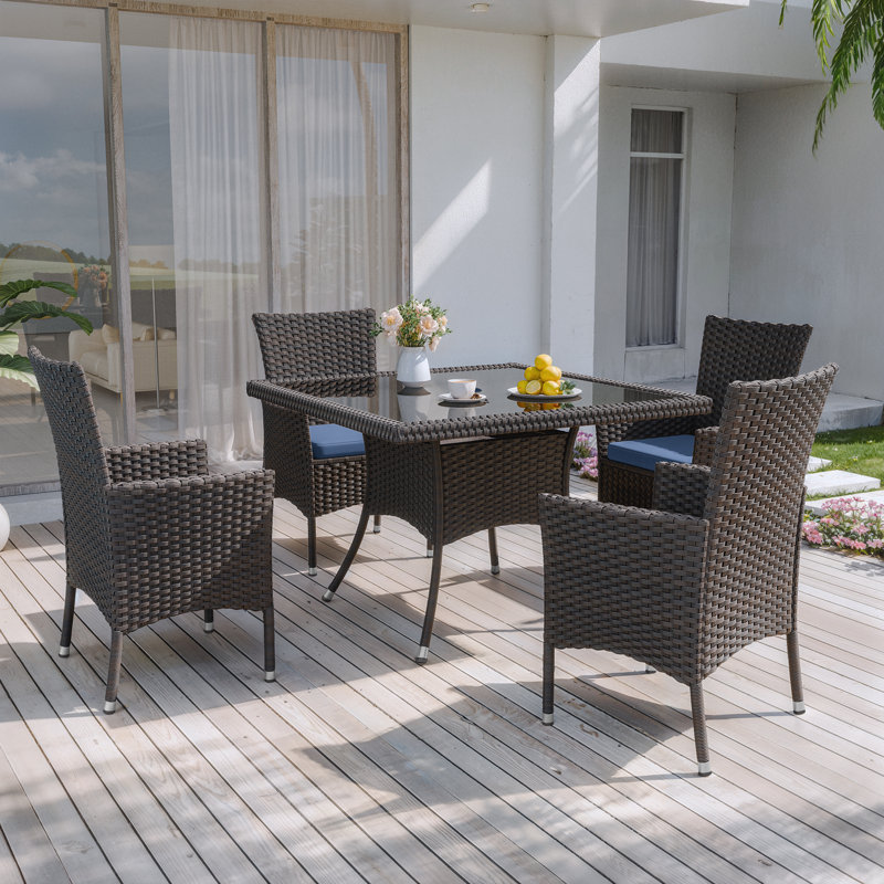 5-Piece Outdoor Rattan Dining Set With Cushions, Armchairs, And Glass-Top Table, Navy