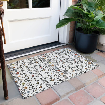 Tapis rectangulaire Aleighna avec envers antidérapant