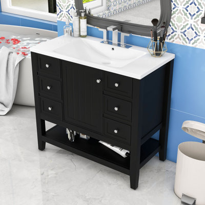 Meuble-lavabo avec une armoire et trois tiroirs