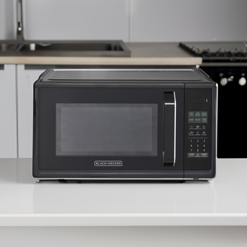 Finition en acier inoxydable noir moderne de 0,9 pi³ Four à micro-ondes 900 watts avec cuisson en plusieurs étapes, Noir