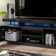 Braderick 63.78'' TV Stand for TVs up to 70", Modern Media Console with Outlet and RGB LED Light
