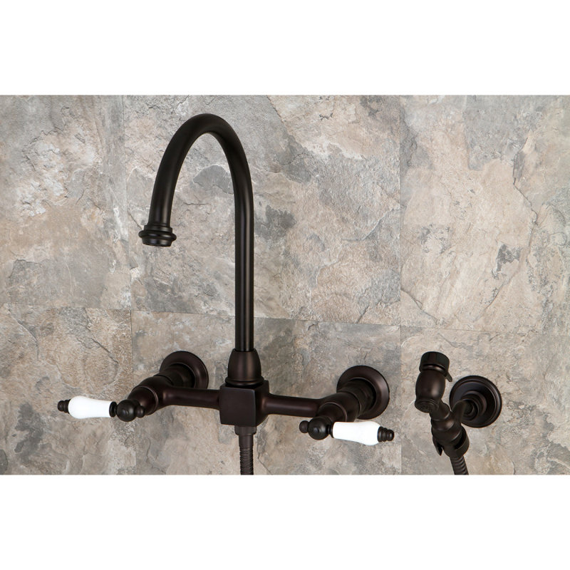 Kingston Brass Restoration Double-Handle 3-Hole Wall-Mount Bridge Kitchen Faucet with Brass Sprayer, Oil Rubbed Bronze/White