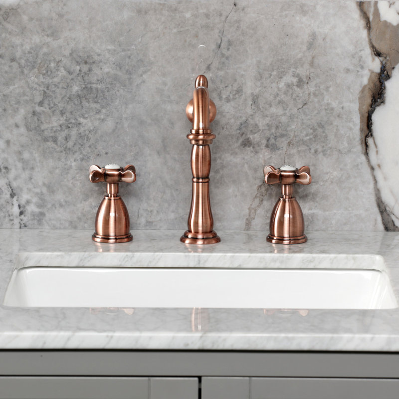 Kingston Brass Essex Two-Handle 3-Hole Deck Mount Widespread Bathroom Faucet with Pop-Up Drain, Antique Copper