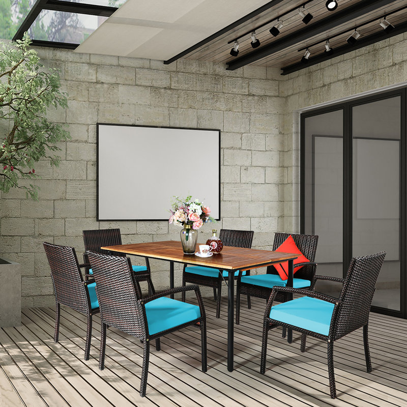 Reeltown 6 - Person Acacia Wicker Patio Dining Set with Rectangular Table , Cushions Included, Turquoise