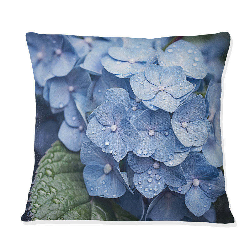 Coussin décoratif à imprimé floral bleu et vert Blooms Heaven