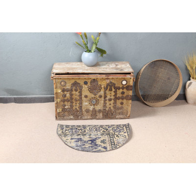 Superbe tapis turc rond d'inspiration antique brun idéal pour le vestibule ou comme tapis de porte