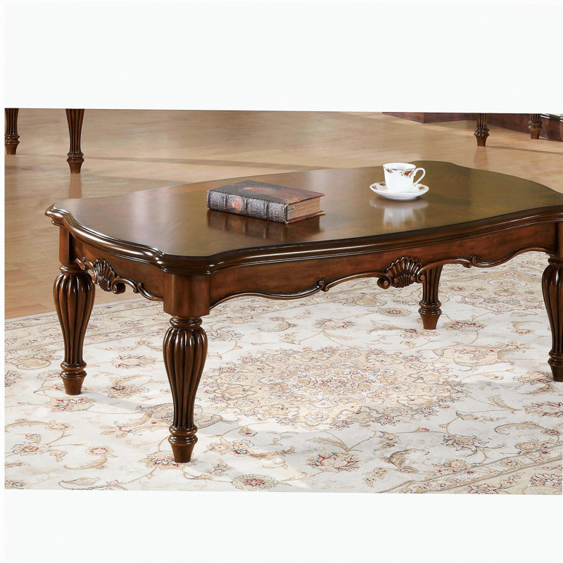 Table basse cerise rectangulaire, pieds tourbillonnants