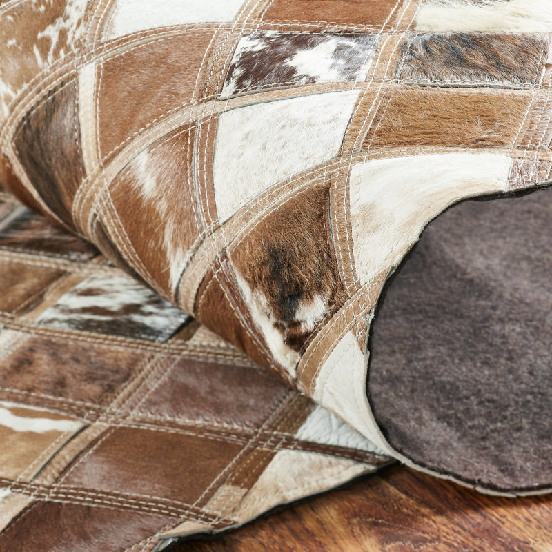 Brelin Cowhide Patchwork Area Rug in Brown, Novelty 8'6" x 11'6"