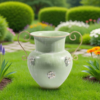 Vase en métal orné de vert