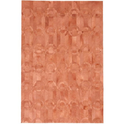 Cowhide Geometric Area Rug in Shrimp