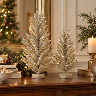 Ensemble de deux sapins de table clairsemés dorés