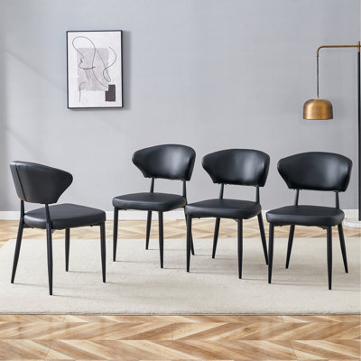 Black Minimalist Ergonomic Dining Chair, With A Curved Backrest For Comfortable Design, Unlocking A Comfortable And Minimalist New Sitting Posture. A Pack Of 4. Available In Black And White.