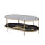 Table basse chic en marbre noir avec support en métal et élément fonctionnel