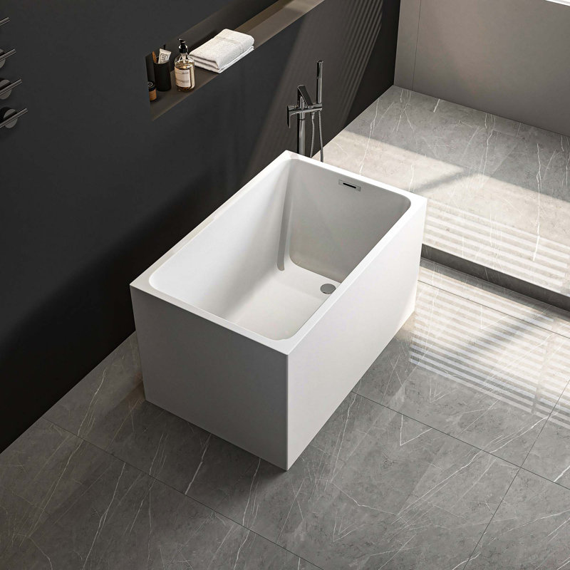 Baignoire autoportante en acrylique de forme rectangulaire spacieuse avec trop-plein chromé et bonde escamotable