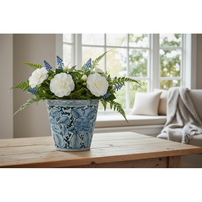 Pot en porcelaine à finition antique fleur bleue et feuille