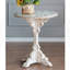 Table ronde en bois sculpté