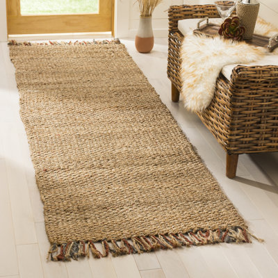 Tapis de couleur unie en jute naturel tissé à la main Debroh